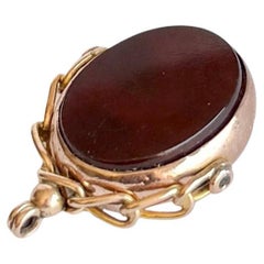Portafortuna vittoriano in pietra sanguigna e corniola in oro rosa 9 carati