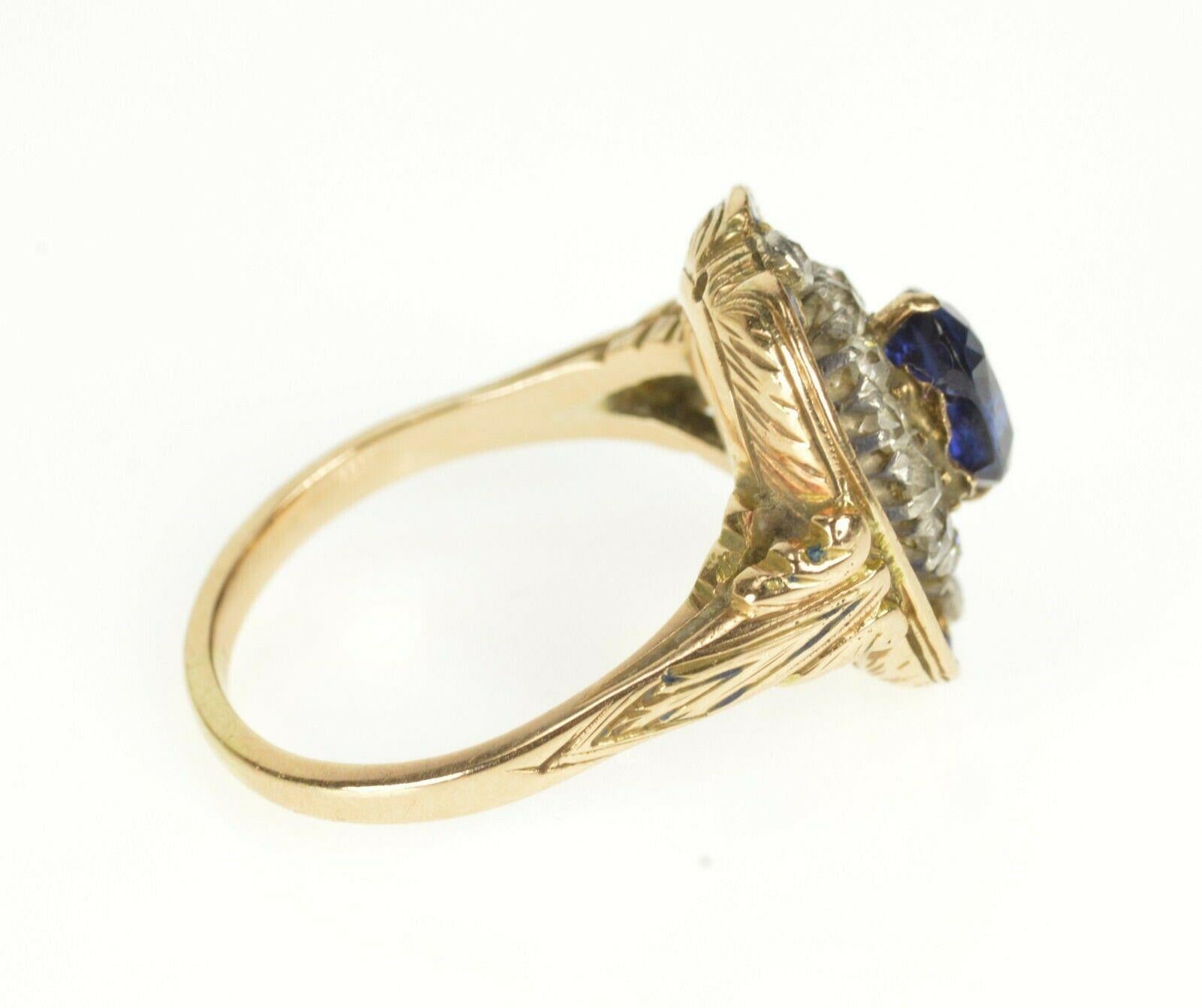Item:  14K Sapphire Diamond Halo Blue Enamel Victorian Ring Size 7.75 Yellow Gold

Weight:  8g

Gem Stone:  14x=Rose Cut Diamond

Center Gem Stone:  1x=Natural Sapphire 7.1x5.2

Composition:  14k Gold Tested

Condition:  Estate:Good

Era:  Vintage