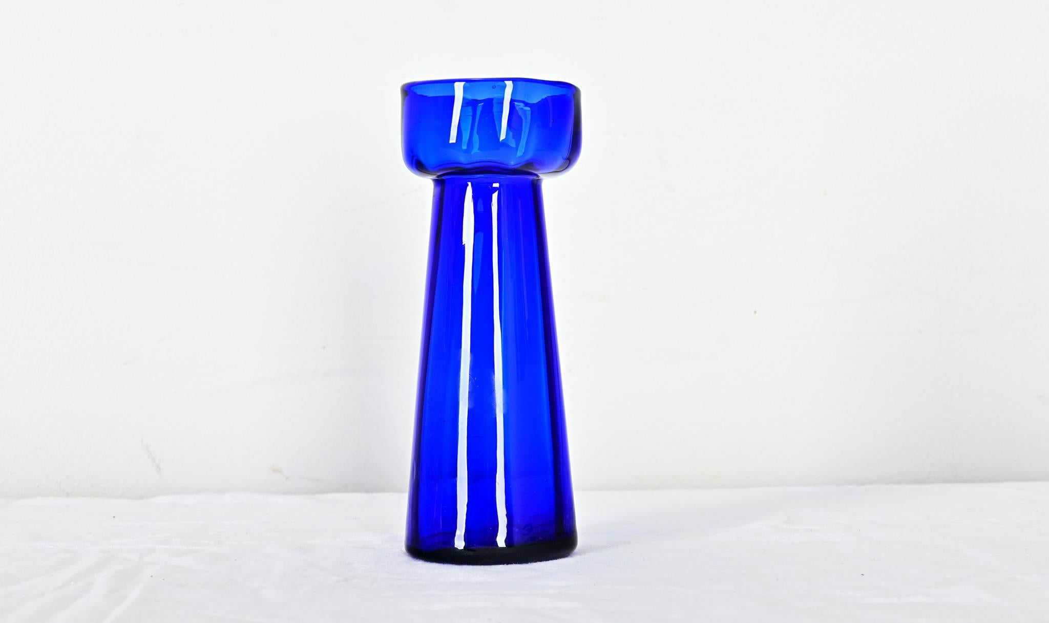 Hand rolled and mouth blown hyacinth forcing vase from the 1890’s in a stunning cobalt blue glass with conical base. Please view the detailed images.