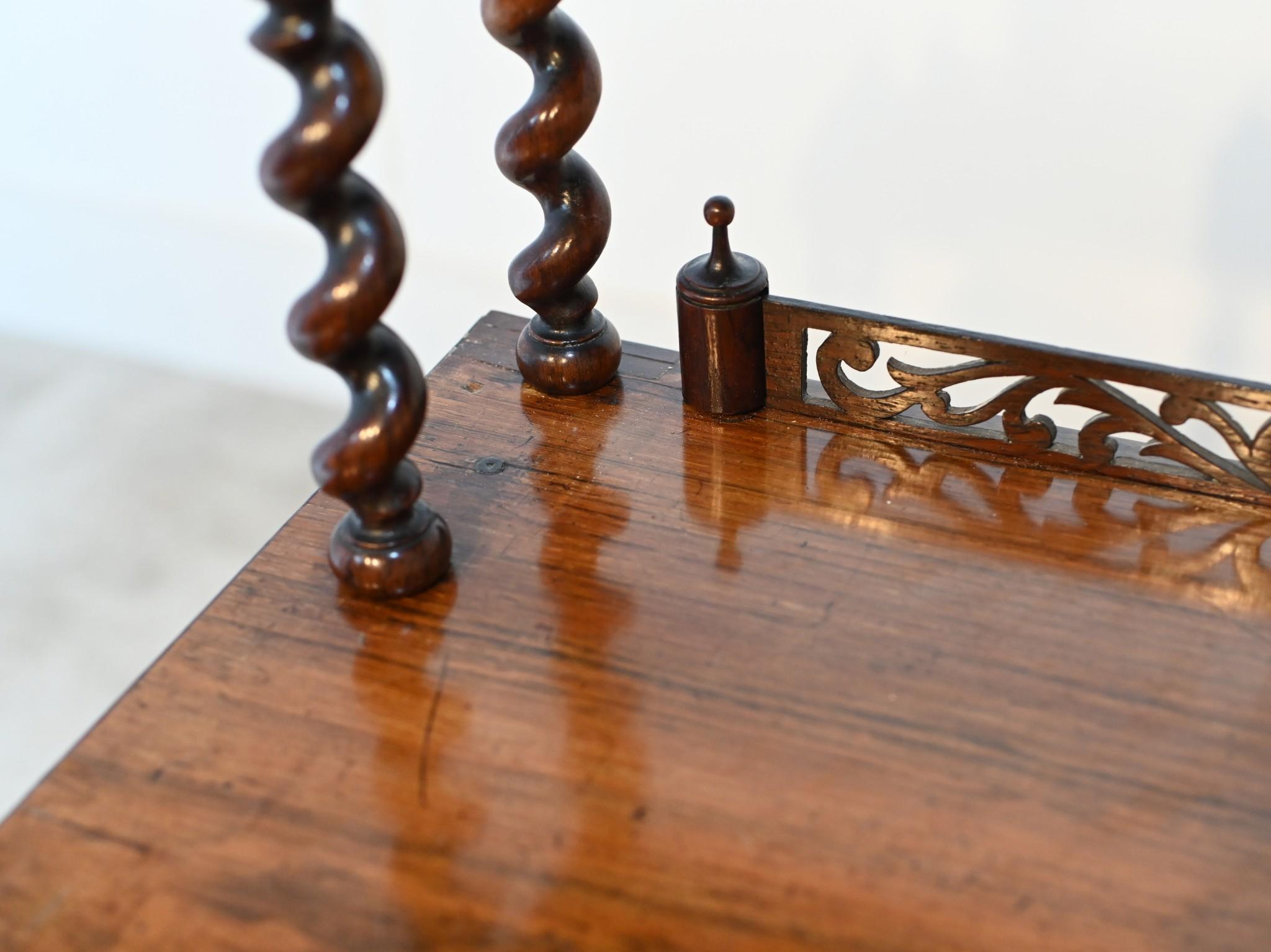 You are viewing a refined Victorian bookcase
Circa 1880 on this mahogany piece of craftsmanship
Intricately carved fretwork and side decoration with barley twist motifs
Bought from a private house in London's Holland Park
Clean, elegant and