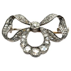 Antique Victorian Bow Brooch with Old Cut Diamonds in Silver and Yellow Gold 