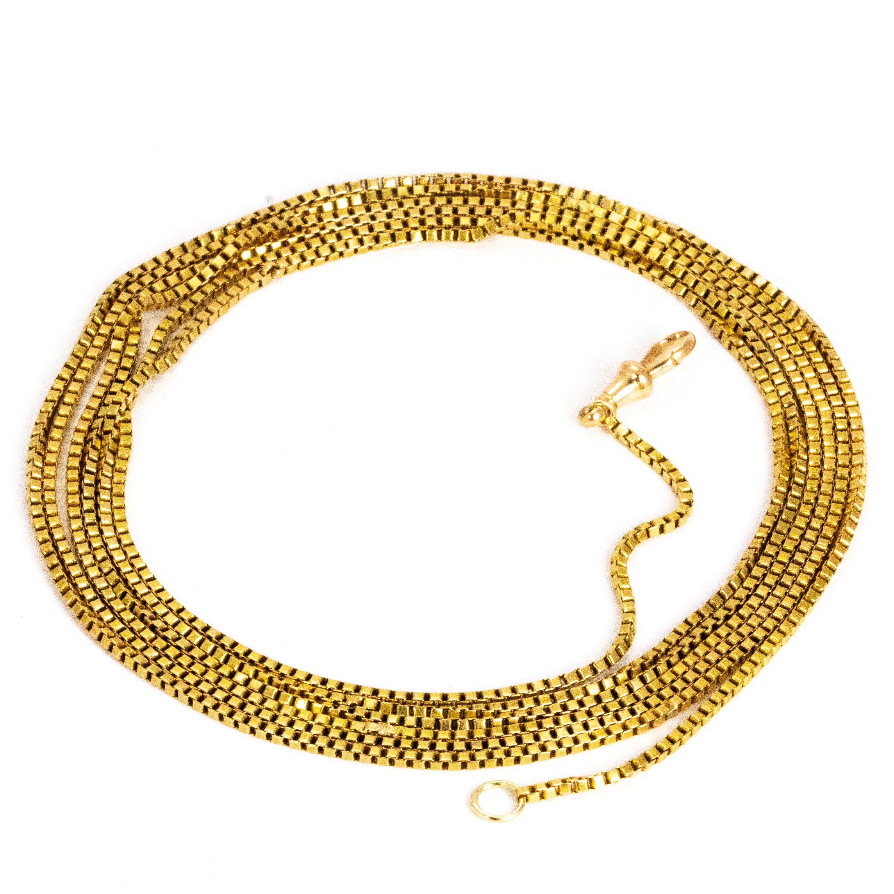 The box link chain on this longuard chain glistens in the light and has such a delicate appearance. This chain is very long and would work well as a long chain or wrapped a number of times to create layers. The necklace is fastened with a dog