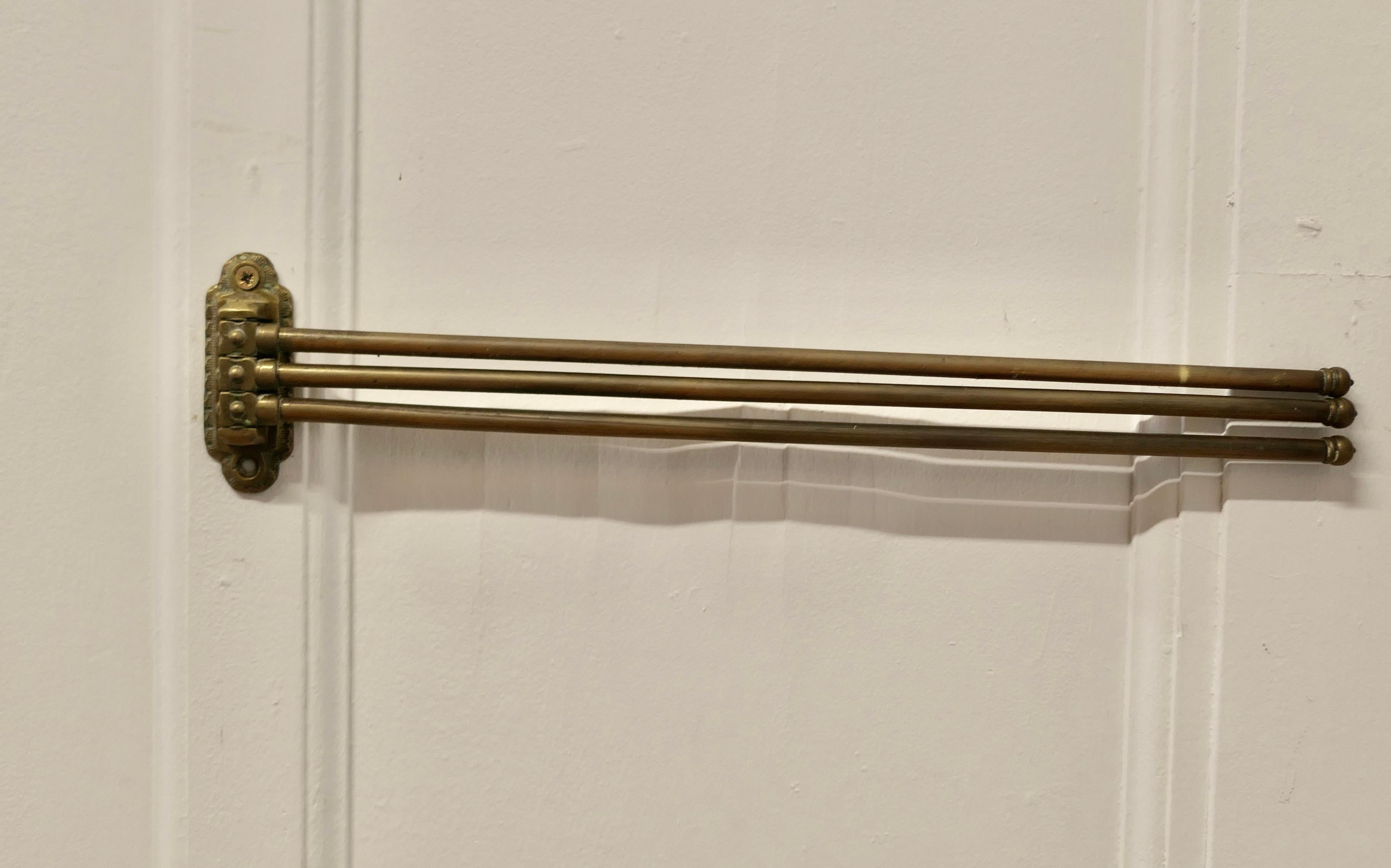 Victorian Brass 3 Branch Folding Towel Rail

This is an elegant little towel rail, it is made in solid brass and has 3 swinging arms, these can be set at choice of angle up to  360°
The rail is 20” long and 4” high  
TVY155