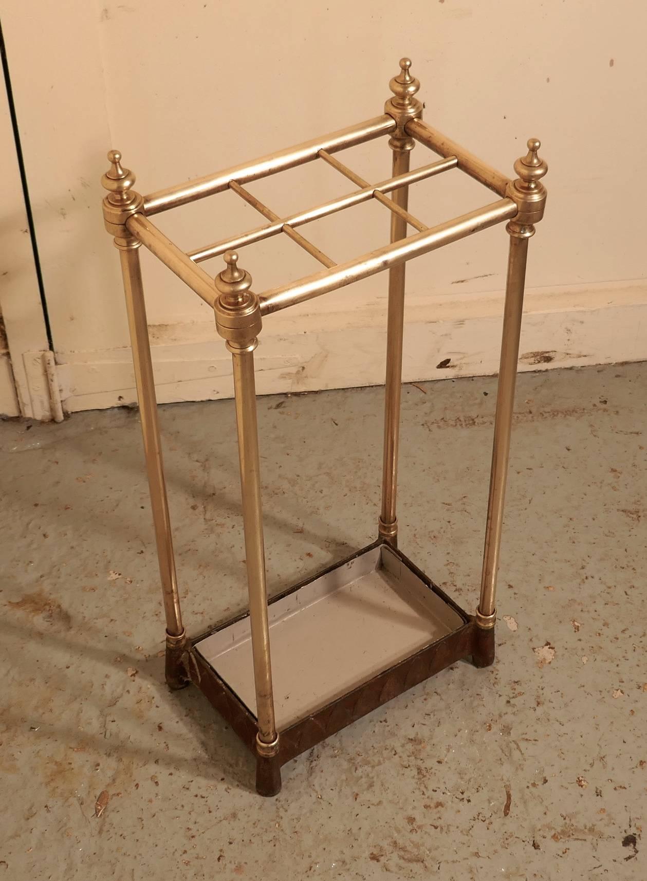 Victorian brass and cast iron walking stick stand or umbrella stand

A charming piece, the stand has a brass top divided into six sections to hold either Walking Sticks or Umbrellas, the heavy iron base holds the drip tray
The stand is 24” high,