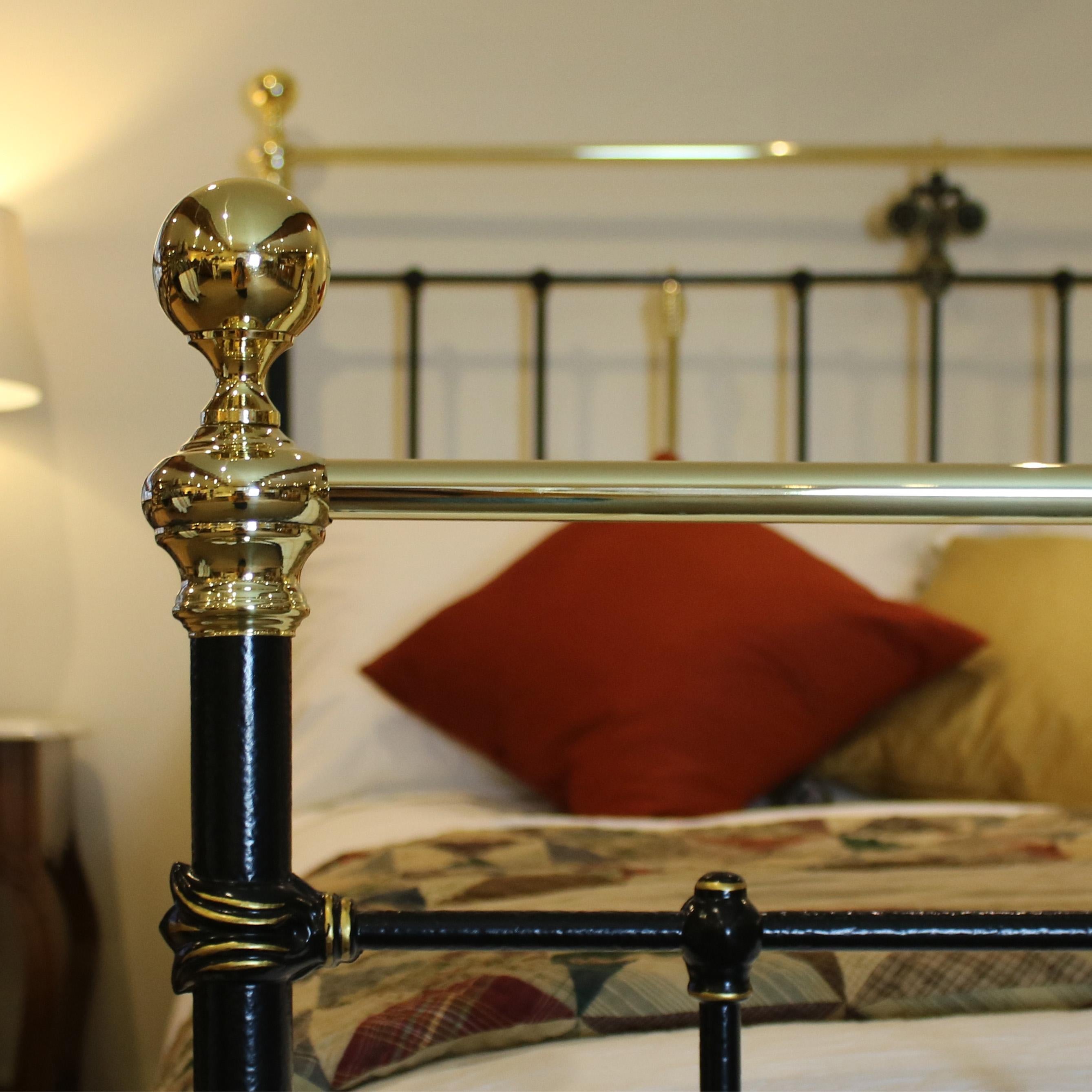 Victorian cast iron and brass bed in black with hand gold line work detailing the castings. This bed has a straight top rail. 

The price is for the bed frame alone. The base, mattress, bedding and linen are extra and can be supplied.