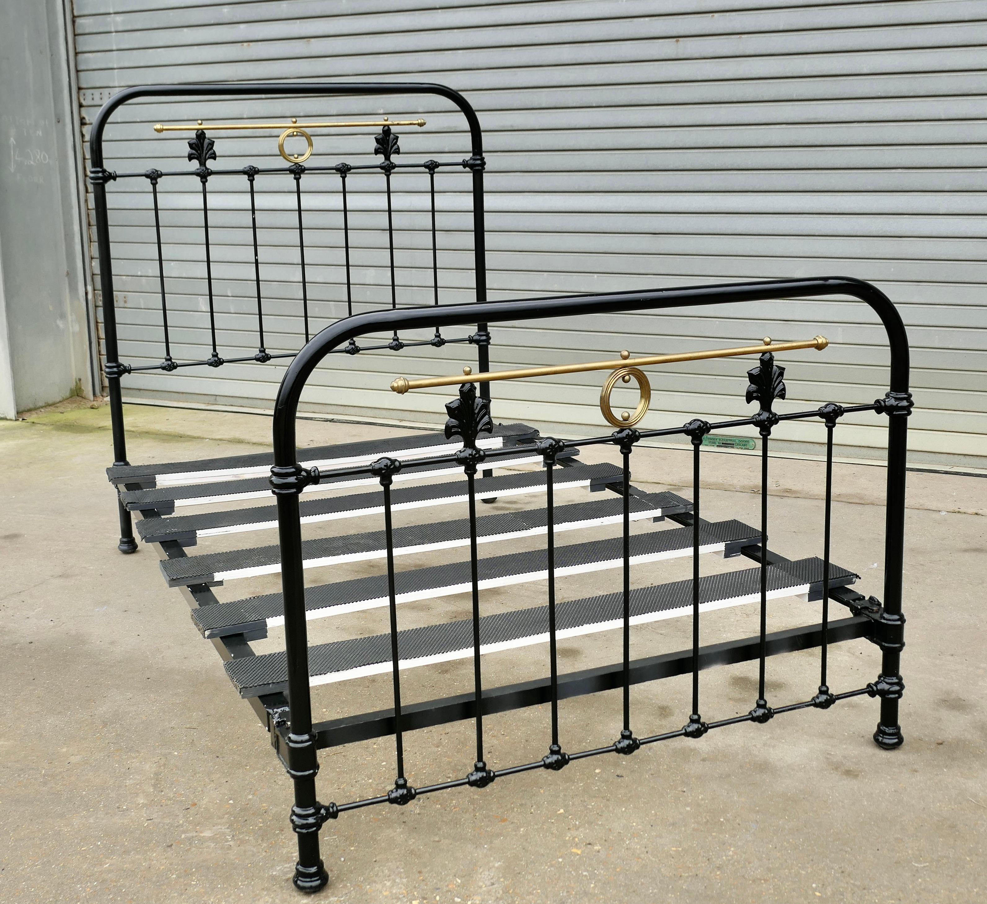 Victorian Brass and Iron Small Double Bed (4ft wide)

A Good Heavy Quality Brass and Iron Bed

The bed dates from 1880, it is heavy quality and has modern purpose made slats
The bed is black with the detail picked out in gold, it has a rounded top