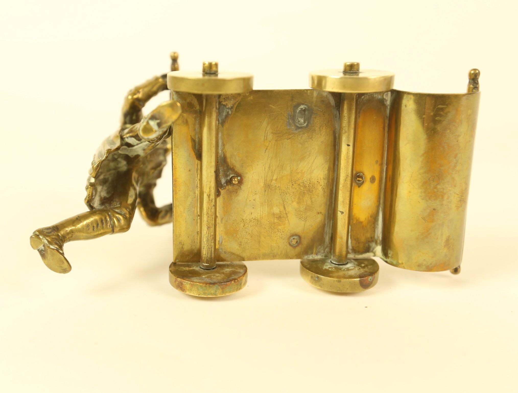 Polished Victorian Brass ink stand  in the form of a  Gentleman Pushing a cart For Sale