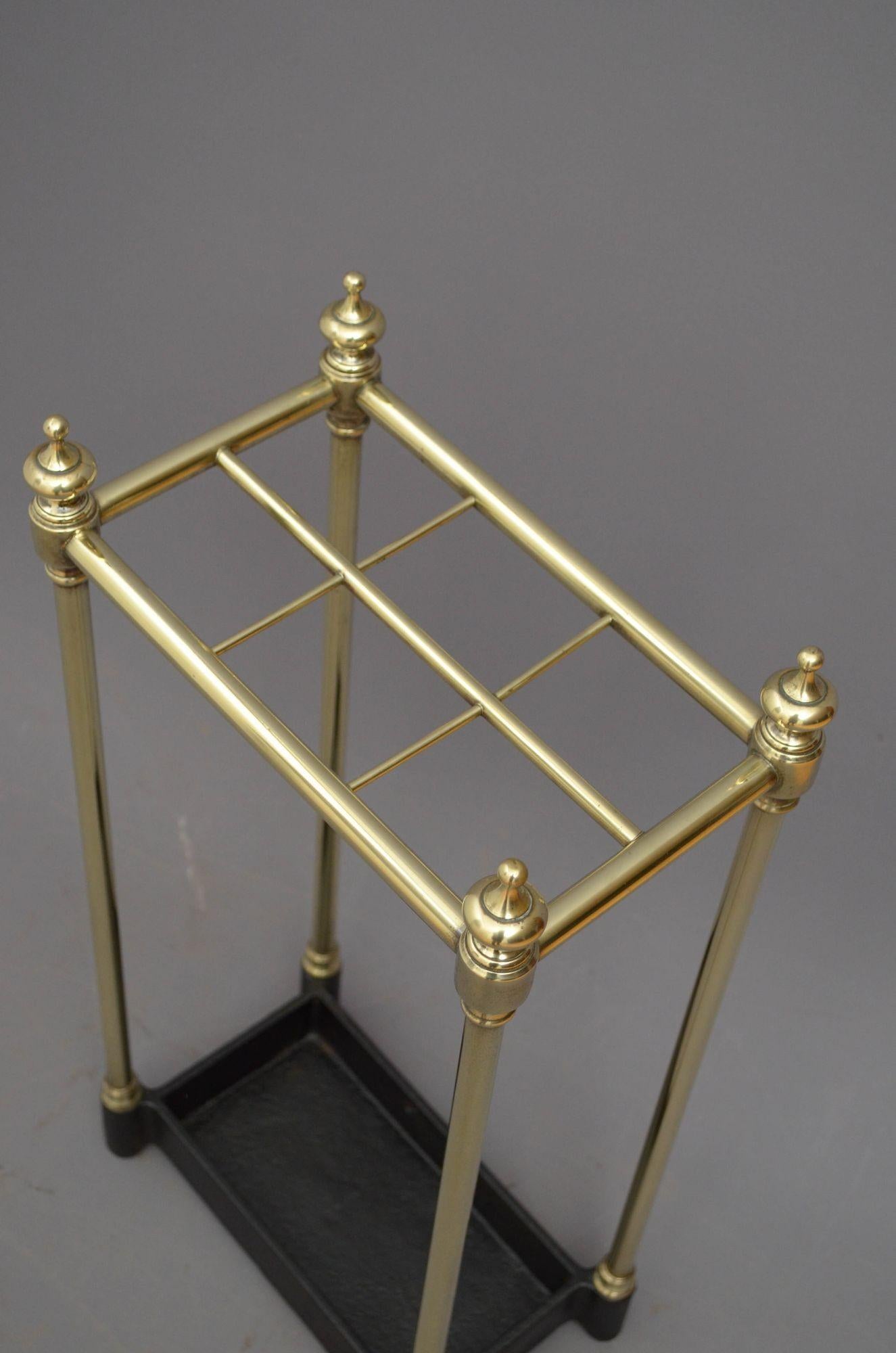 Sn5323 Victorian brass umbrella stand with six divisions, four decorative finials and cast iron drip tray, cleaned and polished ready to place at home. c1880
H24.5