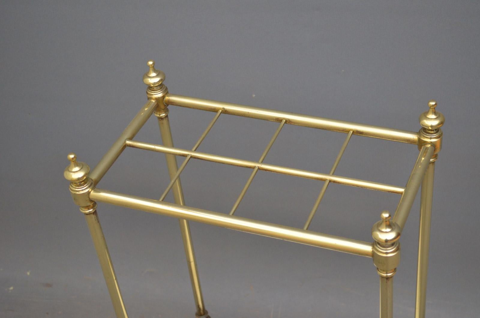 Sn4455 a Victorian brass umbrella stand or stick stand, having 8 sections for umbrellas and walking sticks with finials stamped with date lozenge and removable drip tray, all in fantastic condition throughout, ready to place at home, circa