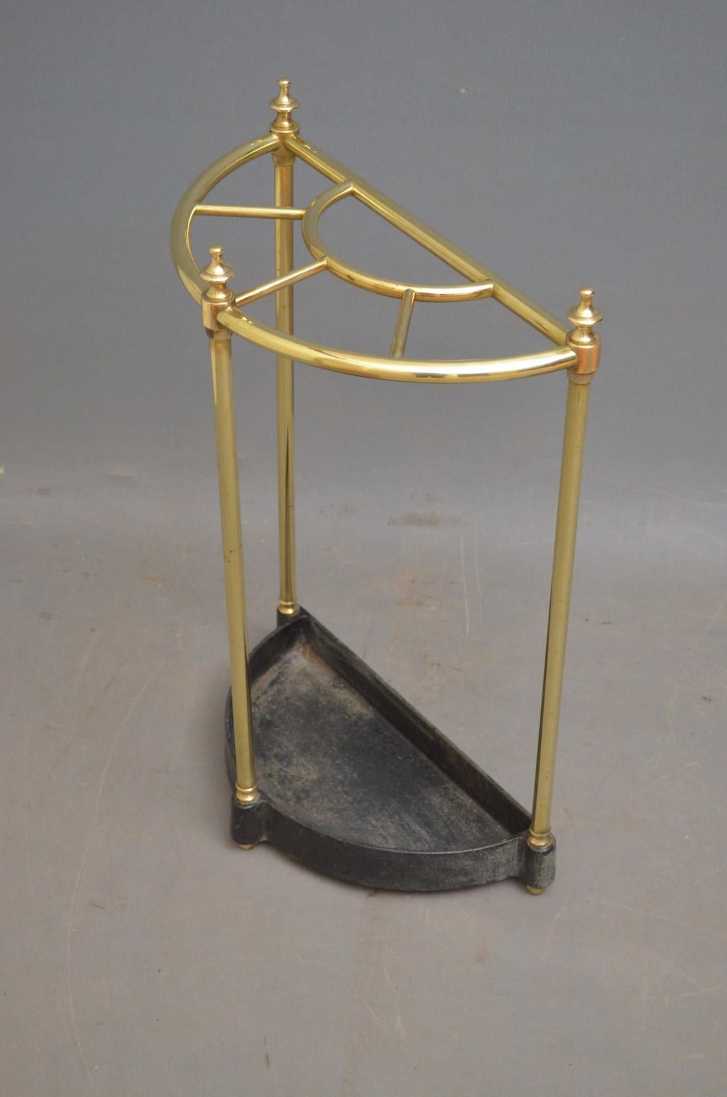 Sn4582, a Victorian brass demilune umbrella stand / stick stand, having 5 sections for umbrellas and walking sticks with finials and a drip tray, all in fantastic condition throughout, ready to place at home, circa 1880
Measures: H 24?, W 16?, D