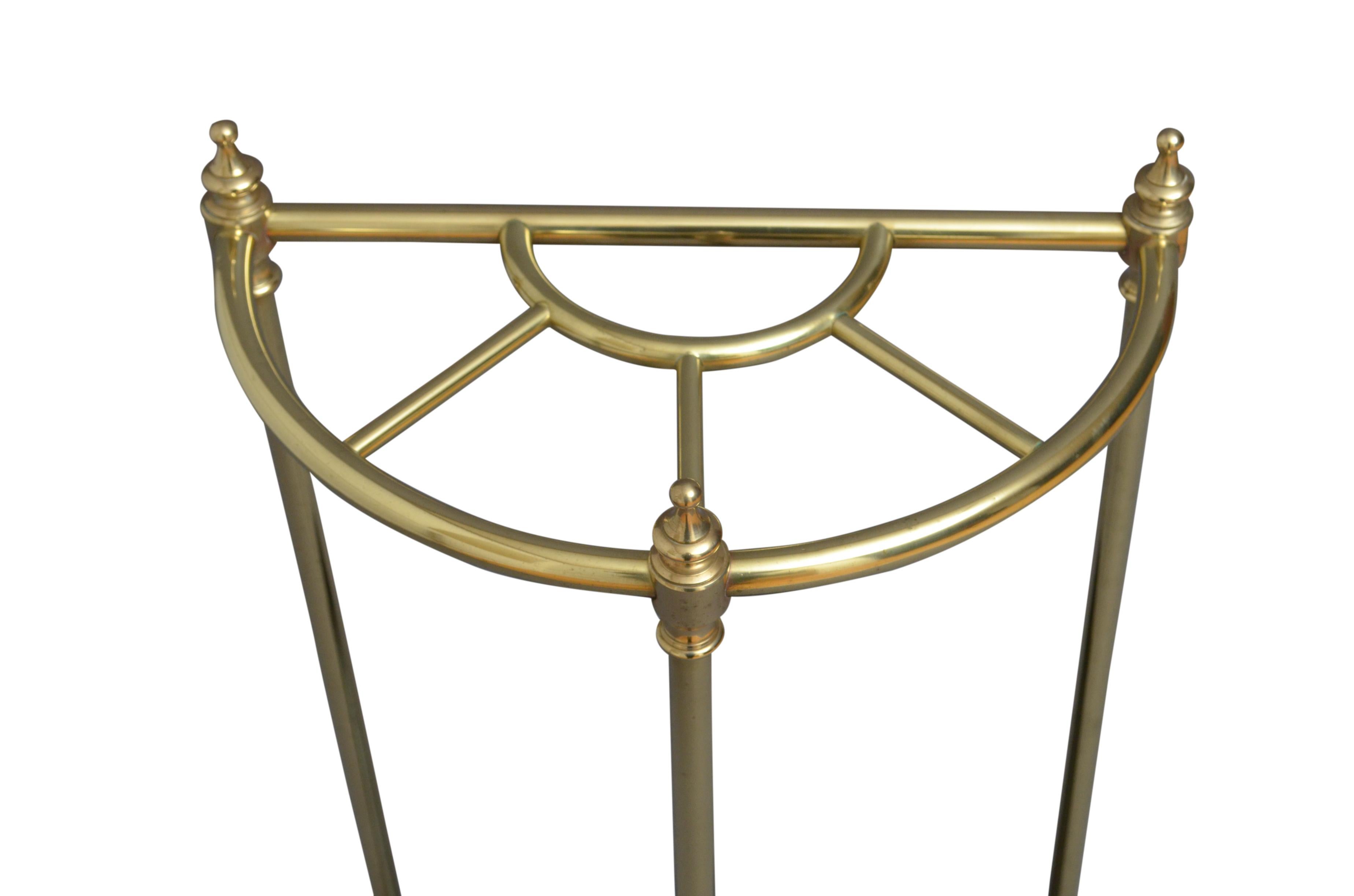 A Victorian brass demilune umbrella stand / stick stand, having 5 sections for umbrellas and walking sticks with finials and a drip tray. This antique umbrella stand has been cleaned and polished and is ready to use at home, circa 1890.
Measures: H