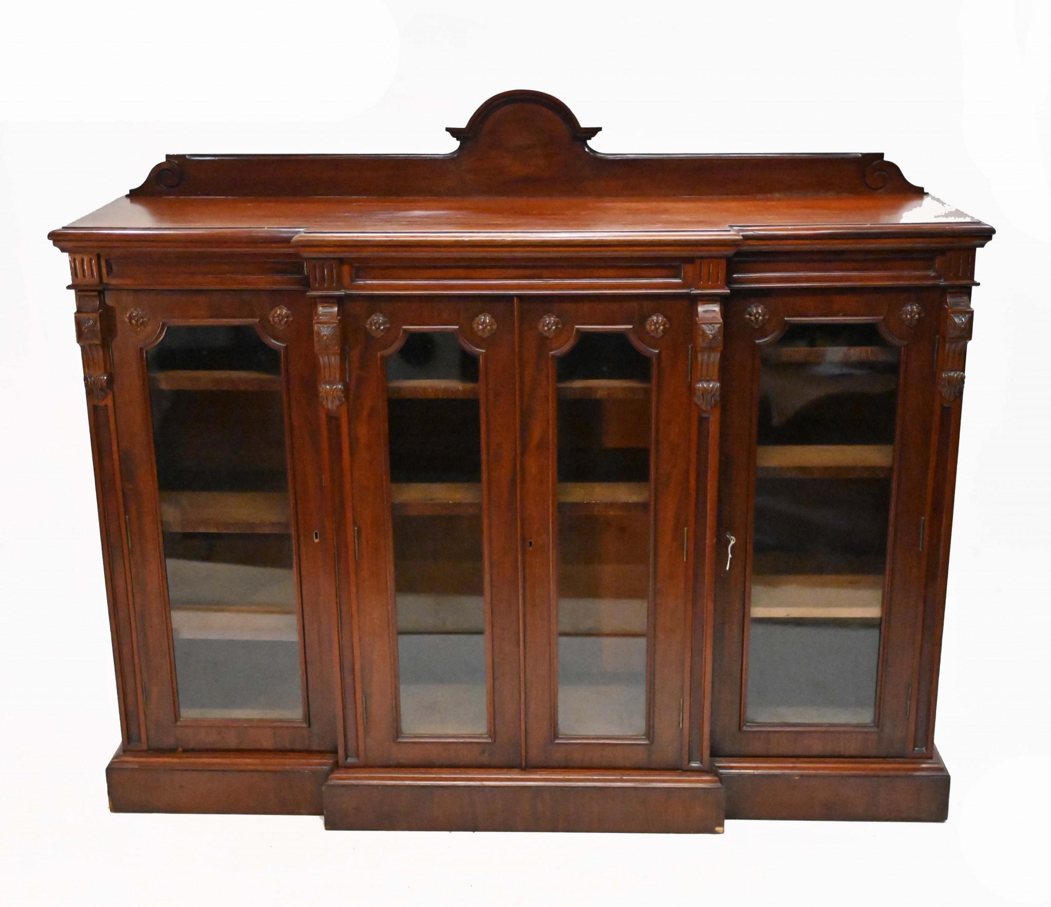 Elegant Victorian bookcase or display cabinet of chiffonier form
Circa 1880 and this has been crafted from mahogany
Plenty of storage with four glass fronted doors
Bought from a private residence in London's Belgravia
Viewings available by