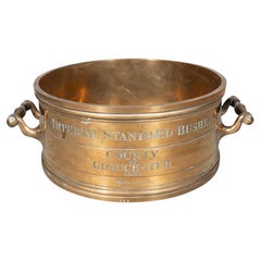 Medida imperial de bronce victoriana