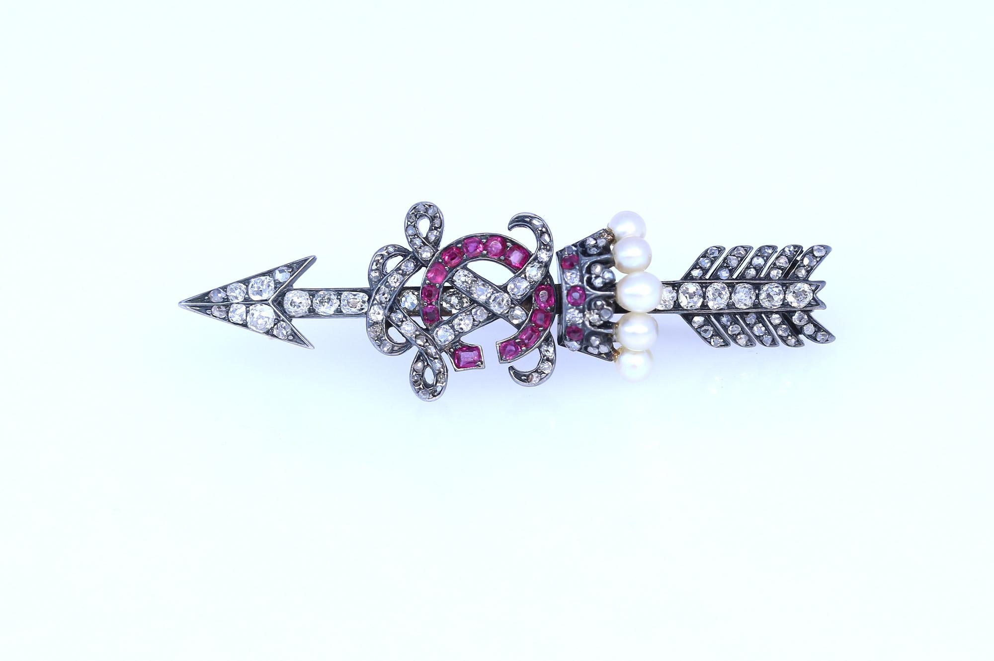 Round Cut Victorian Brooch Arrow Crown Rubies Diamonds Pearls Gold Letters C X, 1900 For Sale