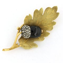 Victorian brooch with garnet and rose cut diamonds 14k gold and silver