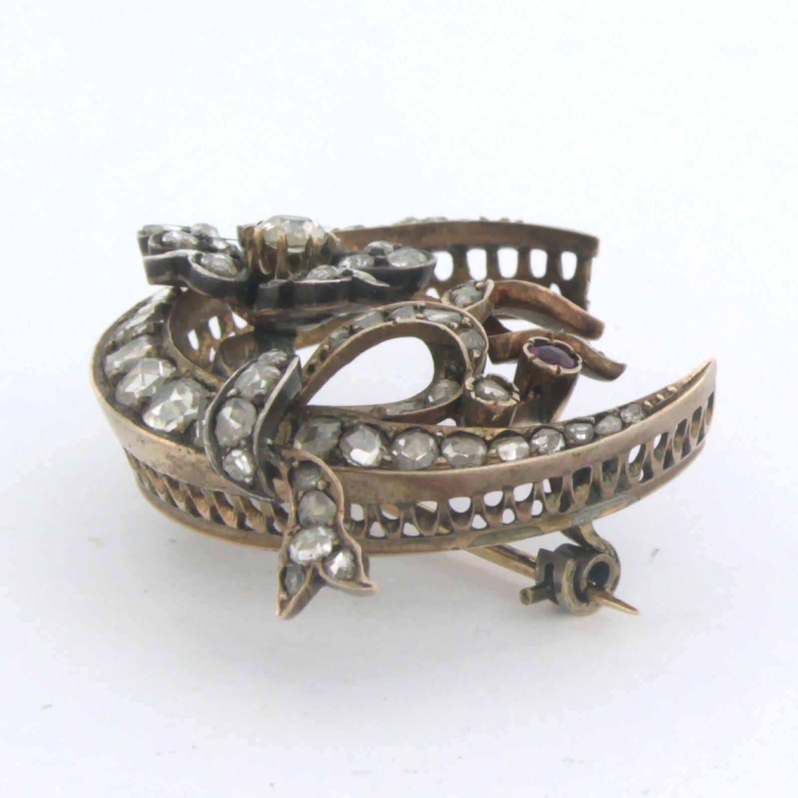 Early Victorian Victorian brooch with ruby and ol mine/ rose cut diamonds up to 1.00ct 14k gold For Sale