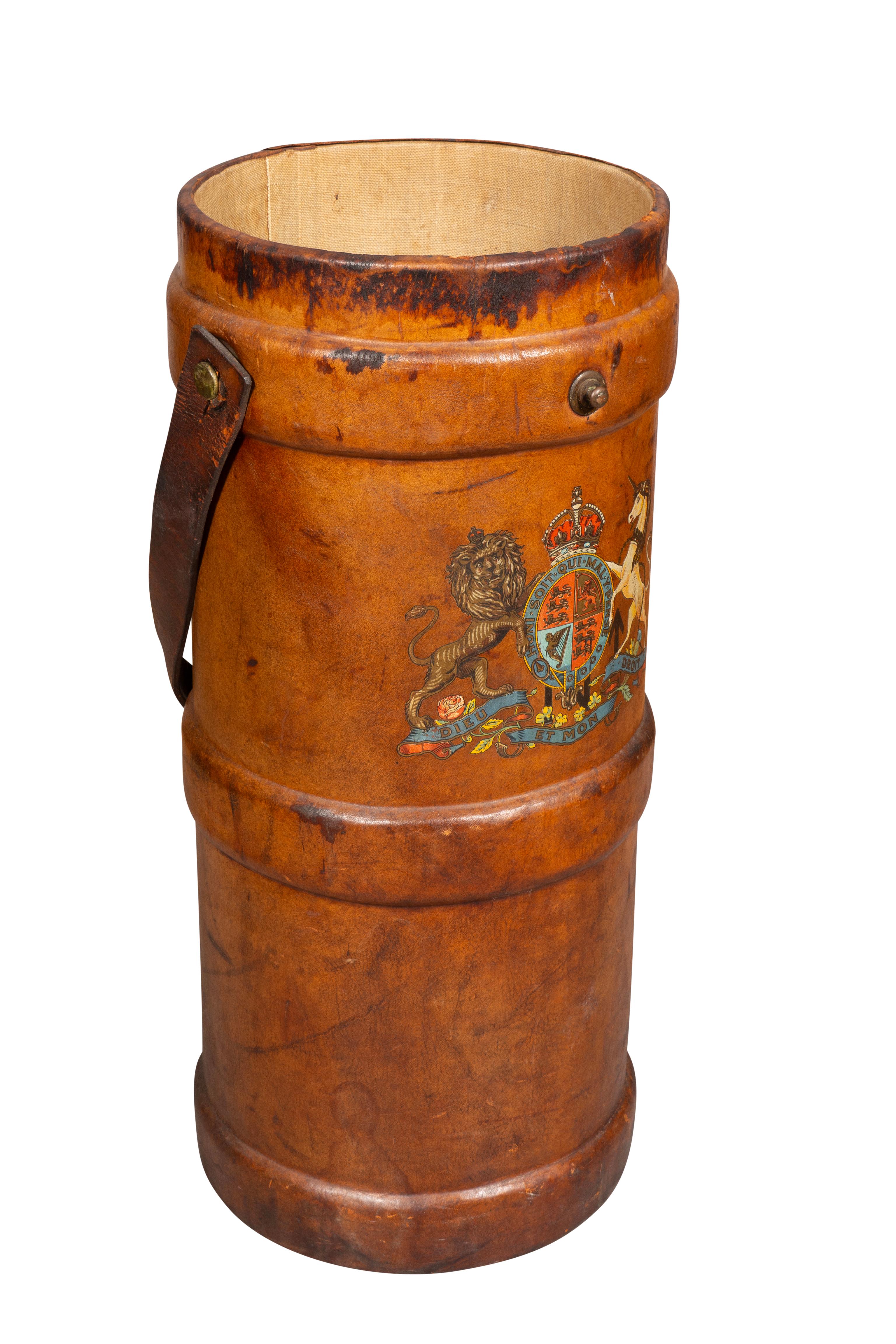 Cylindrical with handle and crest.