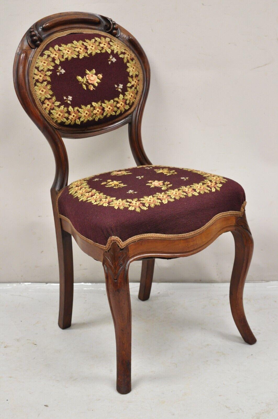 Antique Victorian Burgundy Floral Needlepoint Carved Mahogany Balloon Back Side Chair. Circa 19th Century. Measurements: 36