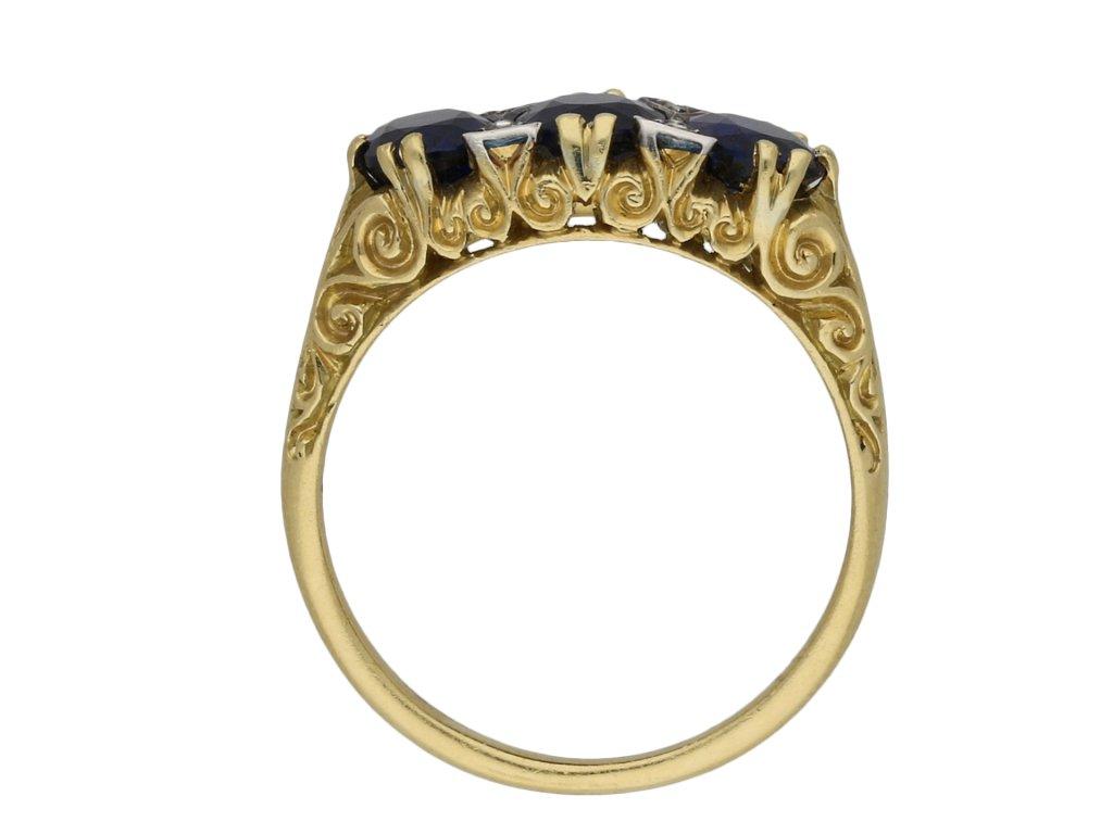 Oval Cut Victorian Burmese sapphire three stone ring, circa 1880. For Sale
