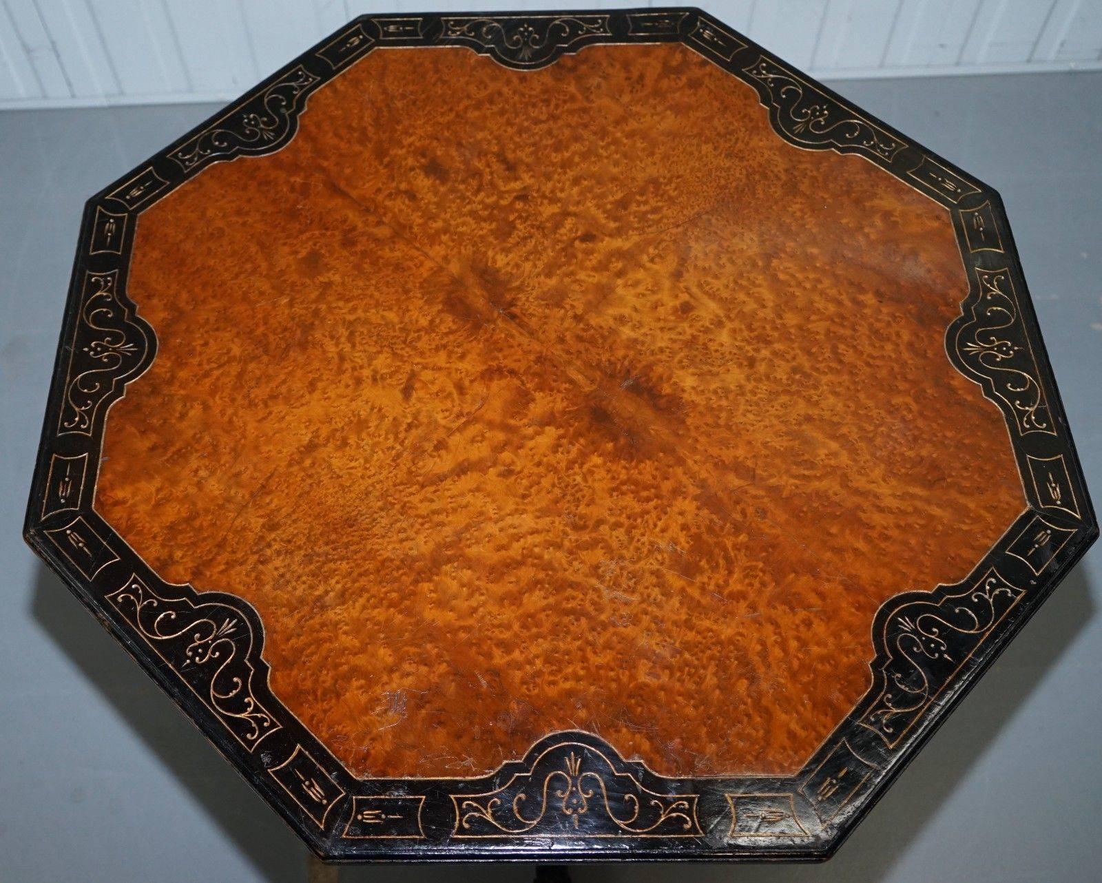 We are delighted to offer for sale this absolutely stunning burr walnut and ebonized black four pillared leg Victorian occasional aesthetic movement octagon table

A very rare early Victorian piece, the burr walnut top is box cut and very thick