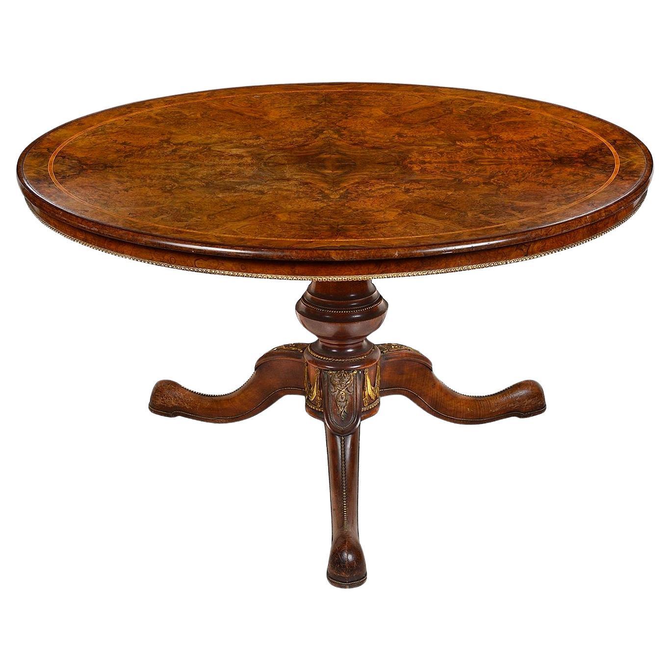 Victorian Burr Walnut centre table, after Holland & Son. For Sale