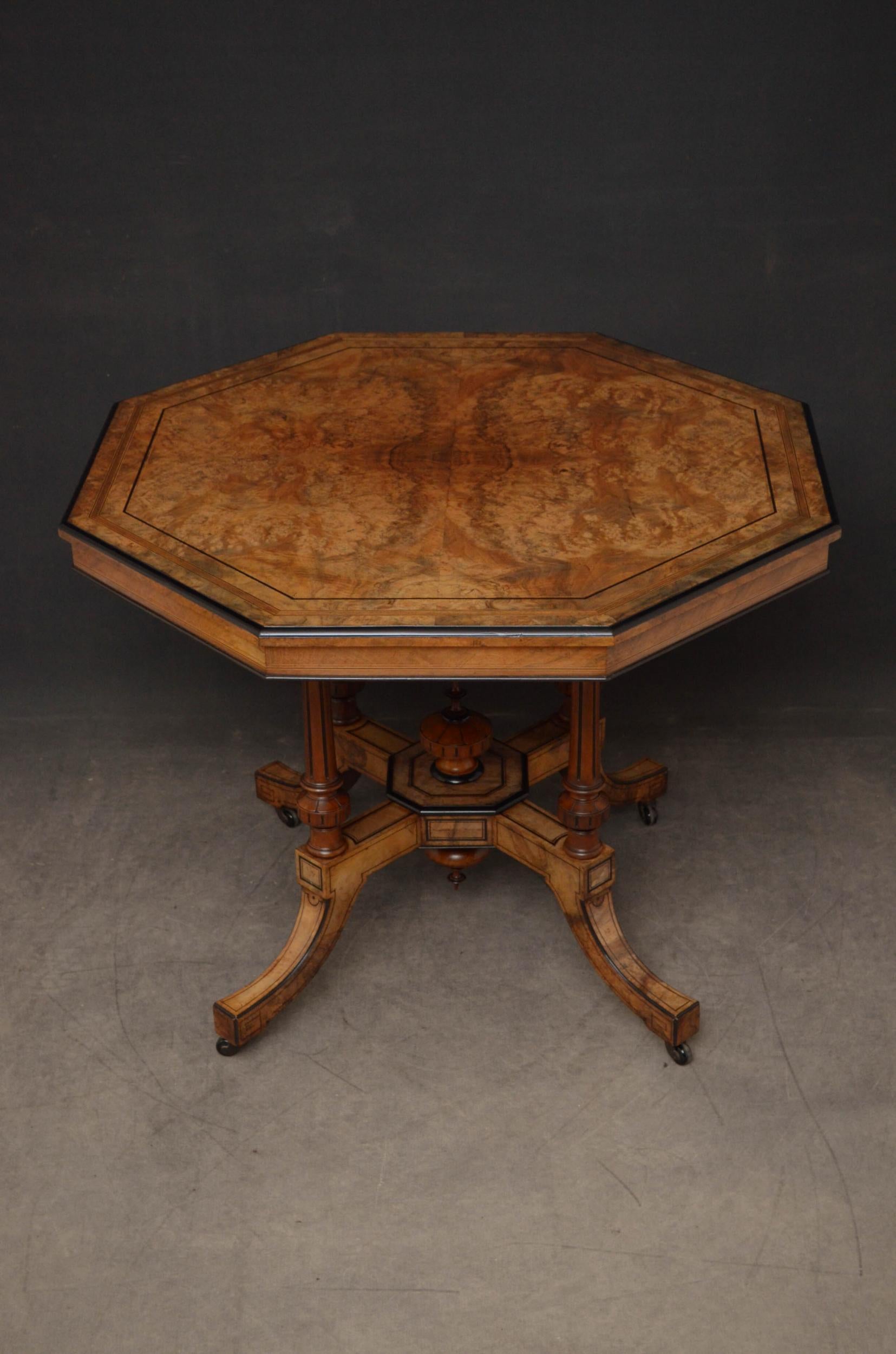 A01 fine quality and very attractive Victorian burr walnut, occasional table, having octagonal top with quarter matched veneers, string inlay, satinwood banding and ebonised edge above sting inlaid edge,  raised on four turned and reeded columns