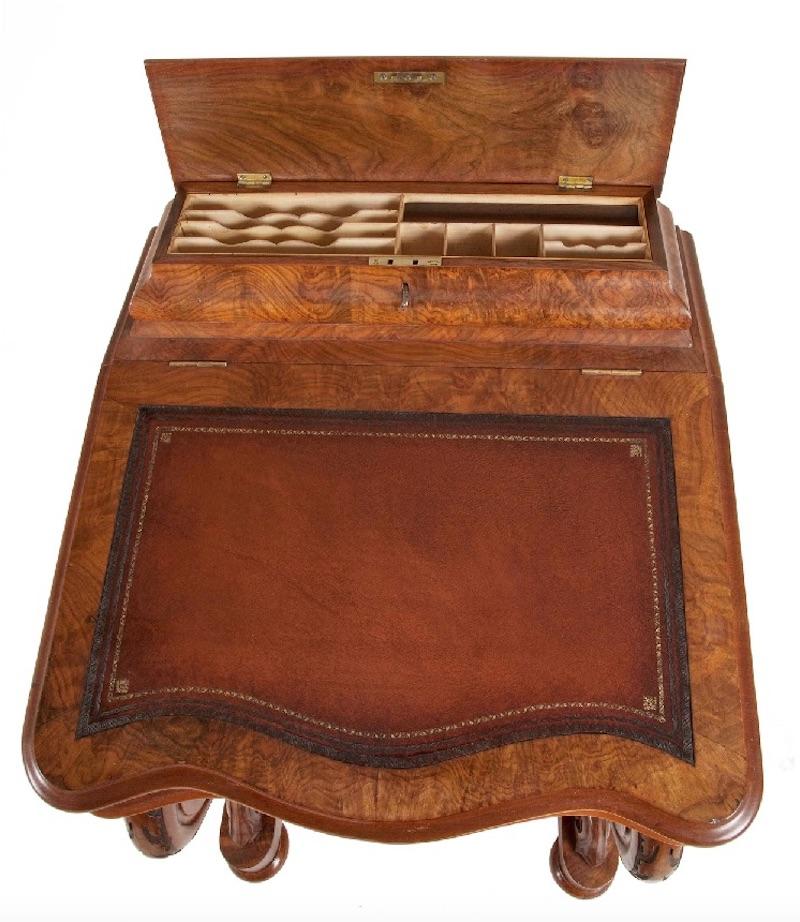 A good Victorian burr walnut Davenport.
Gold toothed leather top with top tier opening to reveal compartments for stationary, ink and pens.
The writing slope opening to reveal a satin birch interior fitted with four drawers.
Drawers on one side