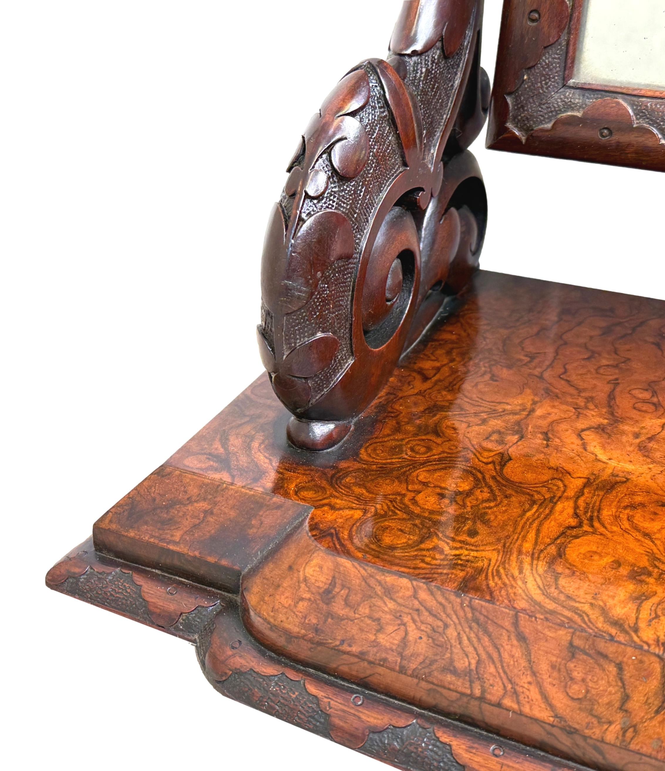 A Very Good Quality Large 19th Century Burr Walnut Dressing Table Mirror, Having Replacement Mirror Plate To Arched Swing Frame With Attractive Moulded Decoration, Raised On Elegant Carved Scrolling Supports Over Superbly Figured Stepped Platform
