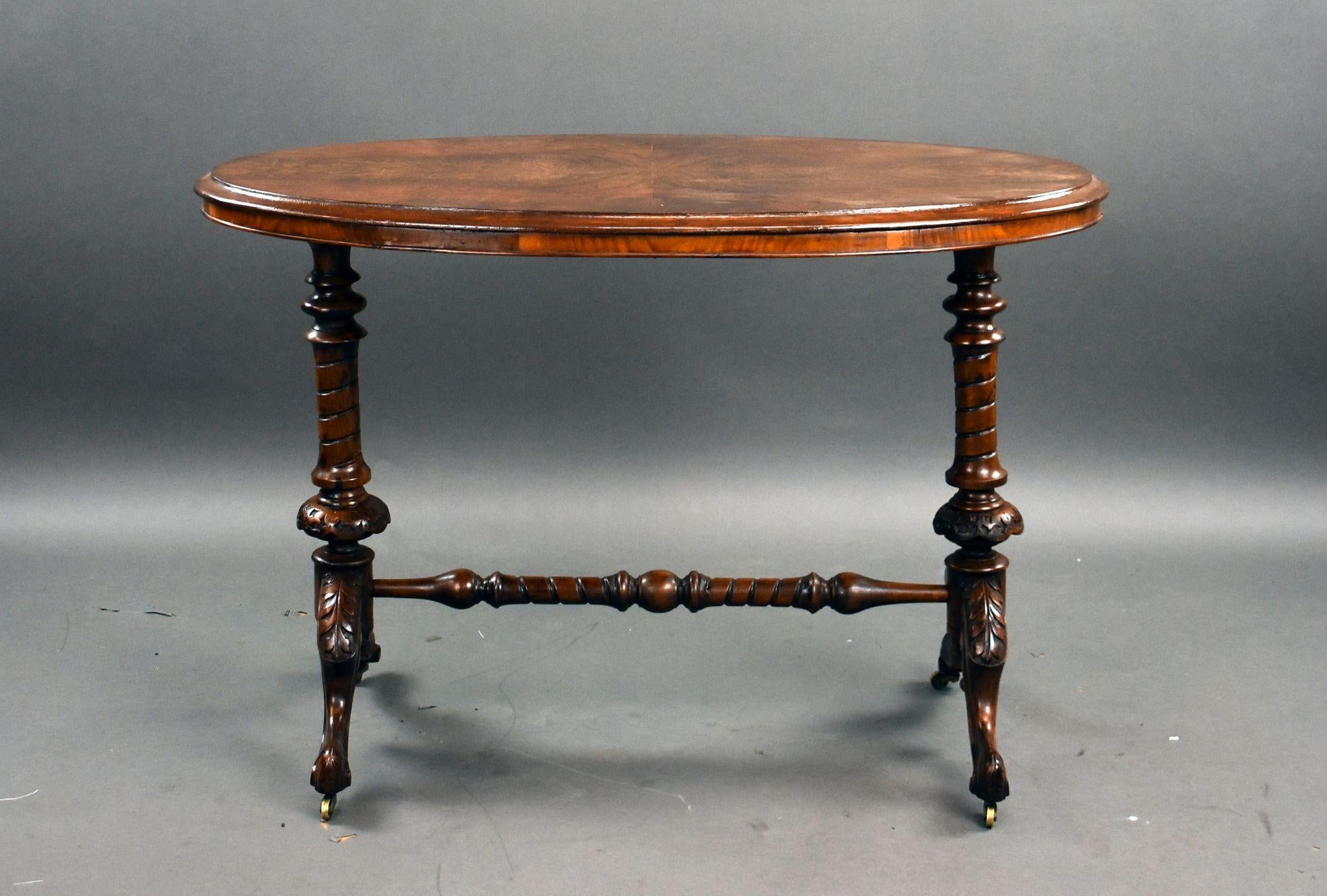 For sale is a good quality Victorian burr walnut table, having an oval top above two turned legs, united by a central stretcher. This piece remains in very good condition for its age.

Width: 104cm Depth: 60cm Height: 70cm