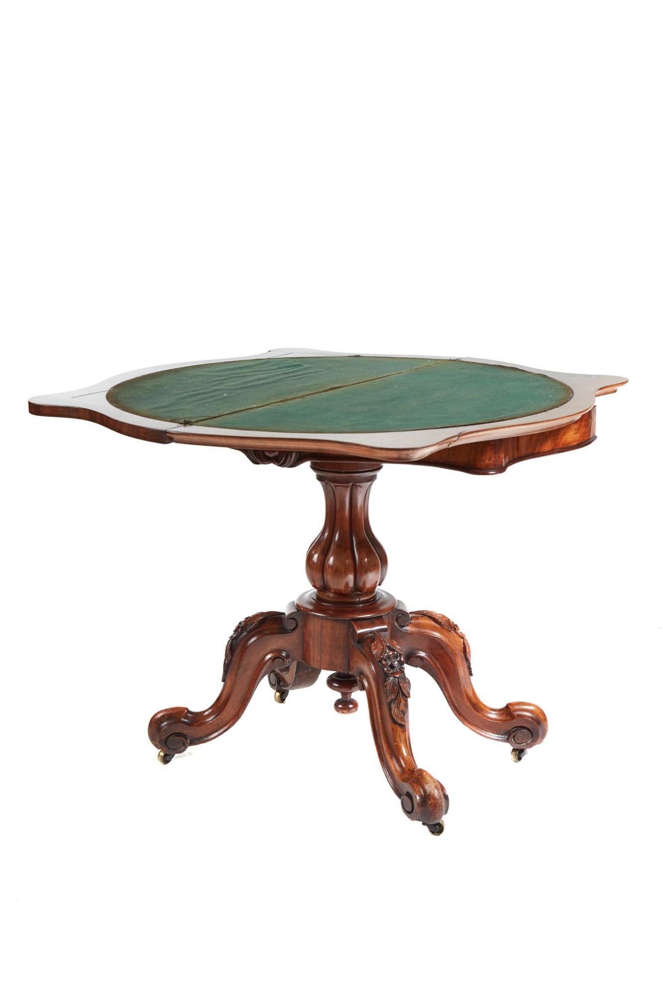 A good quality Victorian burr walnut serpentine shaped card/side table with swivel top, green baize interior, serpentine carved frieze, shaped reeded column supported by four carved shaped cabriole legs on original castors.

Lovely color and