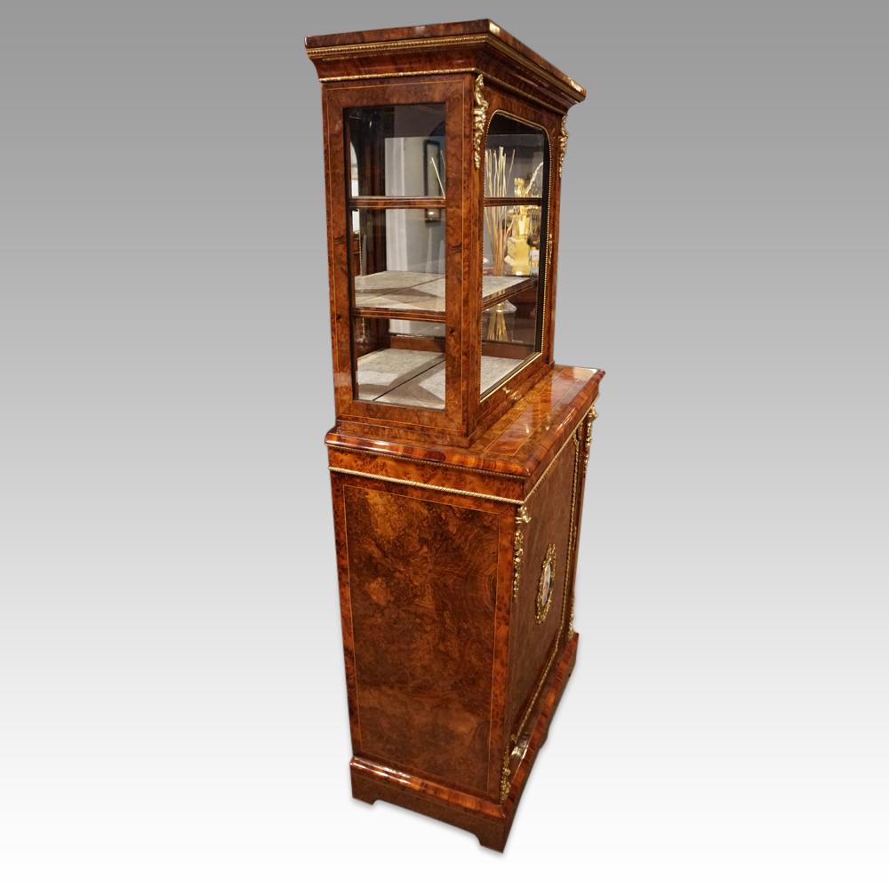 Victorian walnut double pier cabinet
This Victorian walnut double pier cabinet is of exhibition quality and was made circa 1860.
It is made in 2 parts, the top section that is the glazed section fitted for display.
It has a single door that opens to