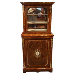 Victorian burr walnut sevres mounted pier cabinet