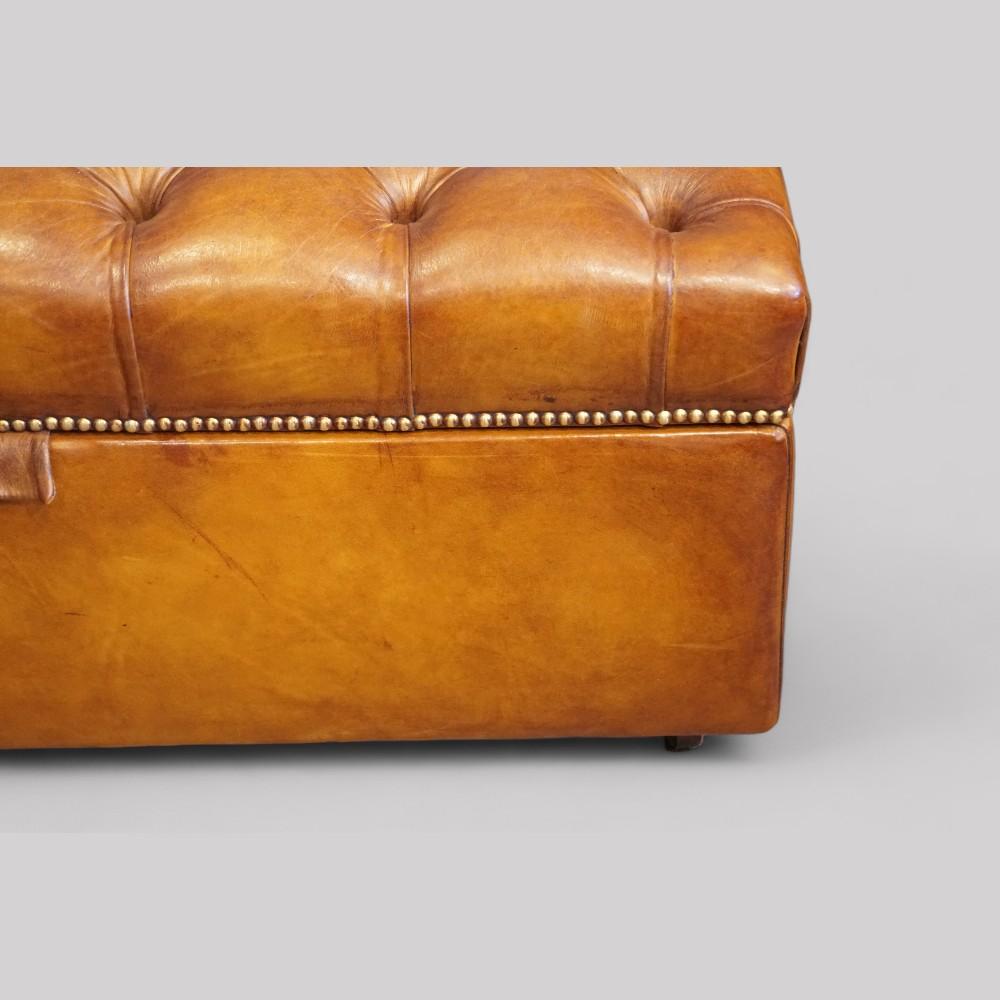 Victorian buttoned leather ottoman
This Victorian buttoned leather ottoman makes a fantastic storage option.
The lid that is deep buttoned with fine leather. The leather has been hand dyed before antiqued.
The lid lifts to reveal a fully lined open