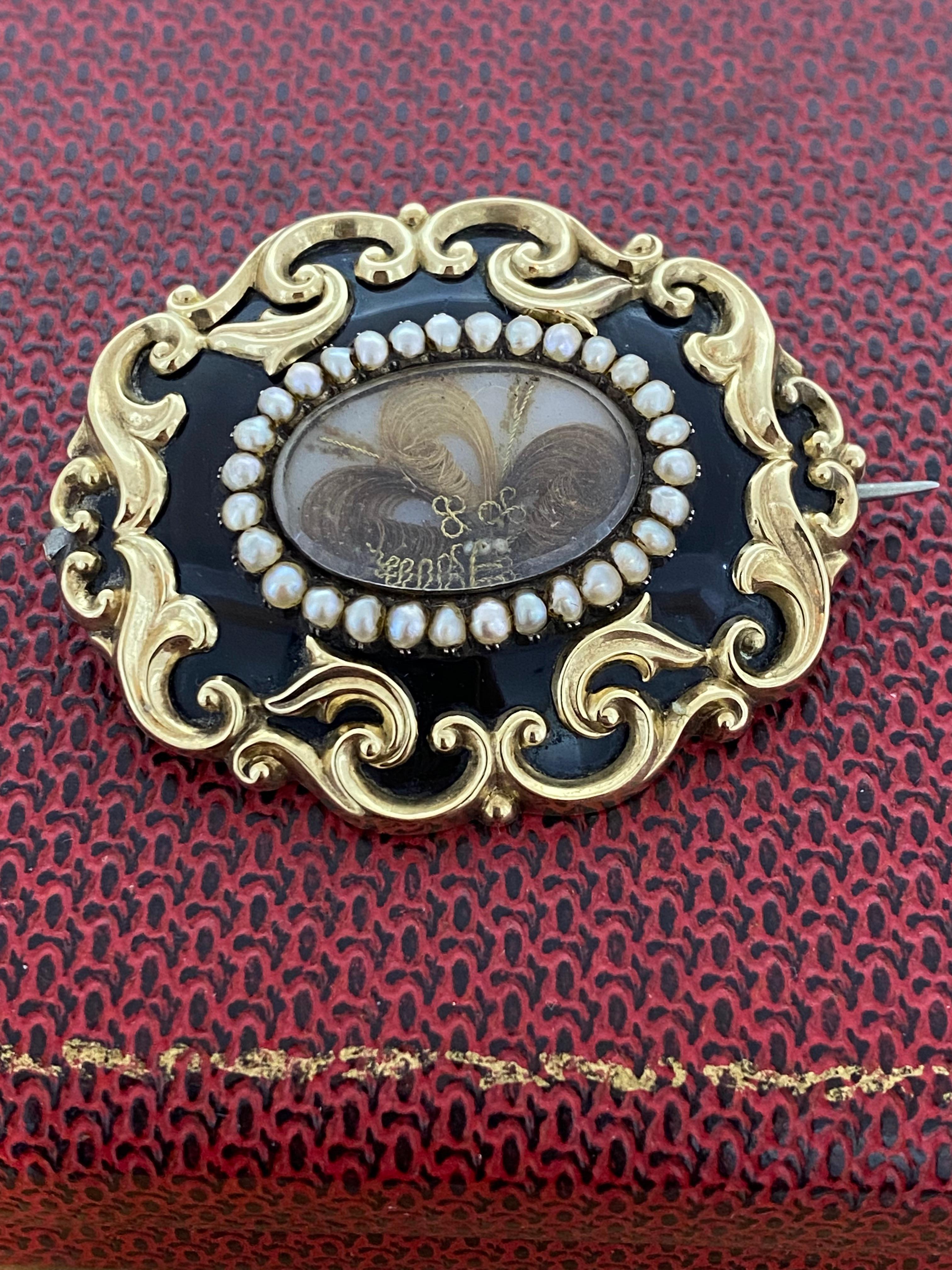 Although Mourning Jewelry has a long & fascinating history, 
going back to as far as Middle Ages, 
its popularity reached its peak during the reign of Queen Victoria
(1837 - 1901).

This extraordinary piece is a Victorian Mourning Brooch,
dating