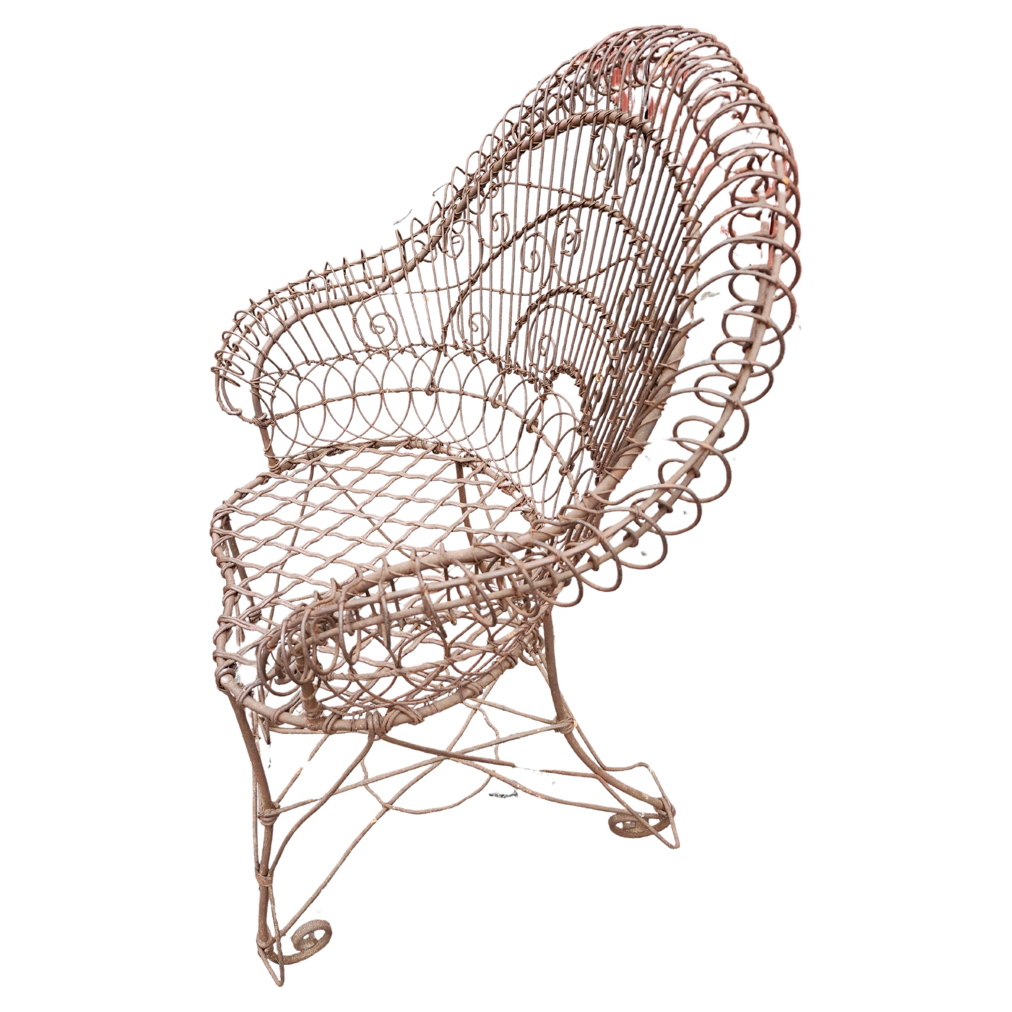 Rare hard to find high back Victorian wire chair in excellent antique condition.  No paint just lots of patina, surface rust, no rot. It's all there and very sturdy.