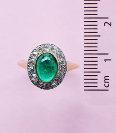 Victorian Cabochon Emerald Ring with Striking White Diamond Surround