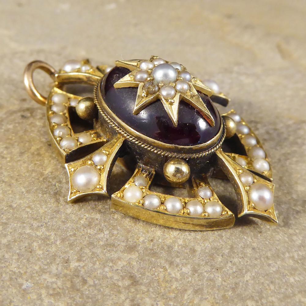 Showing that quality jewellery really does stand the test of time, this gorgeous antique Pendant was hand crafted in the Victorian era. In the centre of this piece sits a large Cabochon Garnet decorated with a Pearl cluster in a yellow Gold star