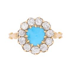 Victorian Cabochon Turquoise and Old Cut Diamond Halo Ring, circa 1880s