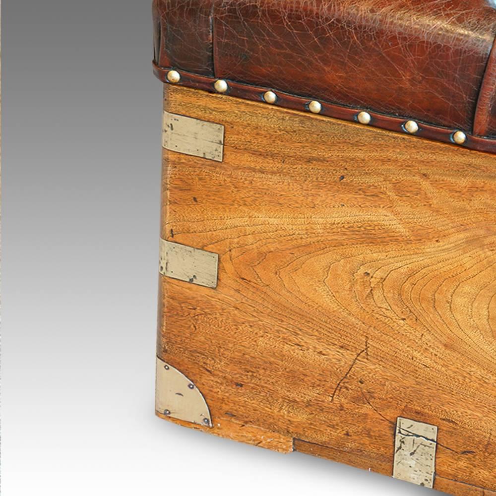 Victorian camphorwood and leather ottoman.
Here we have this wonderful and very useful camphorwood chest with brass carrying handles to each end.
The buttoned antiqued leather lid that lifts with a cast brass loop handles to reveal a large storage