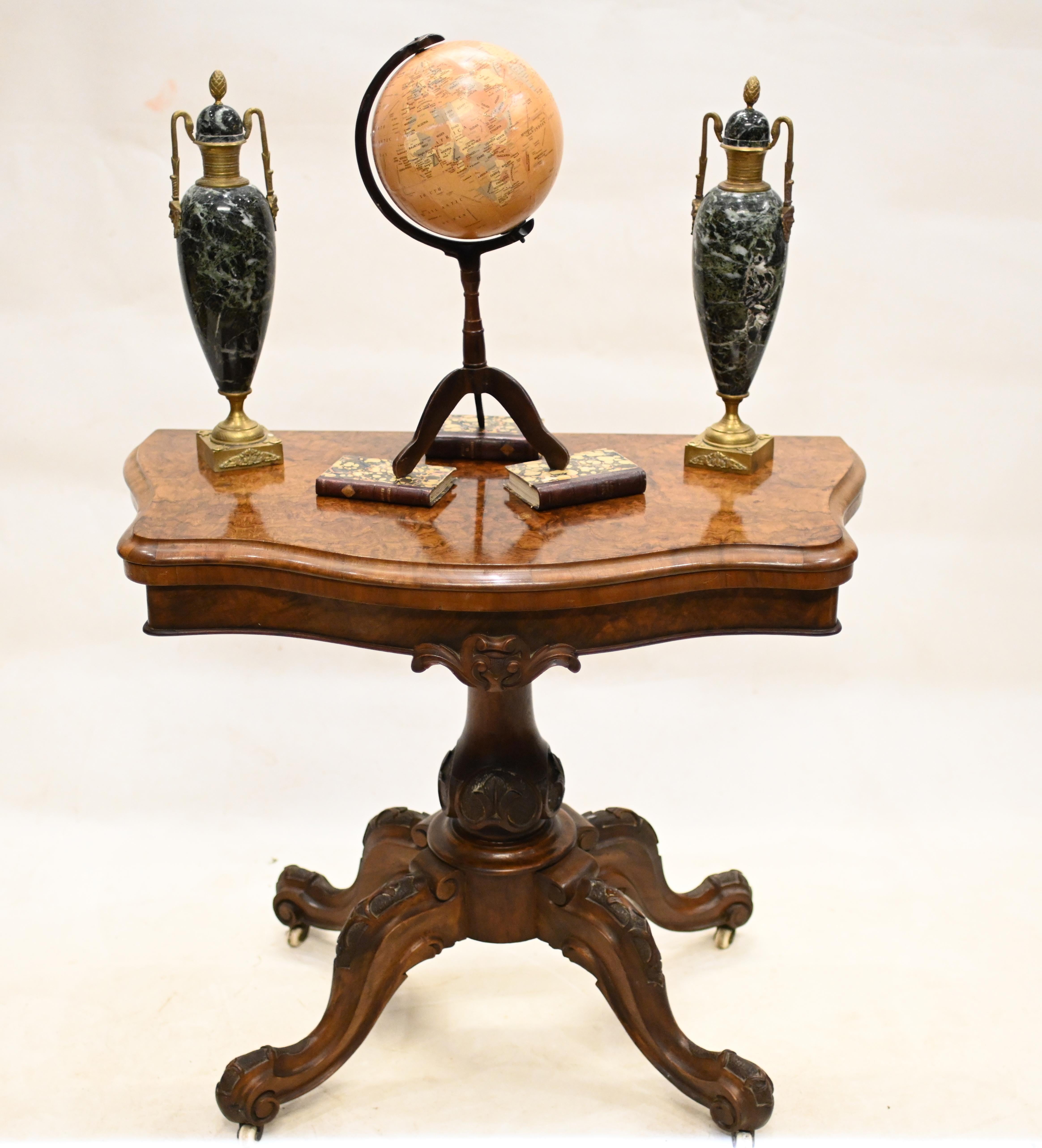 Quality Victorian card table in burr walnut
We date this piece to circa 1880
Table opens out to reveal green beize lined playing surface for cards or board games
Table can also serve as a decorative hall table
Bought from a private residence in
