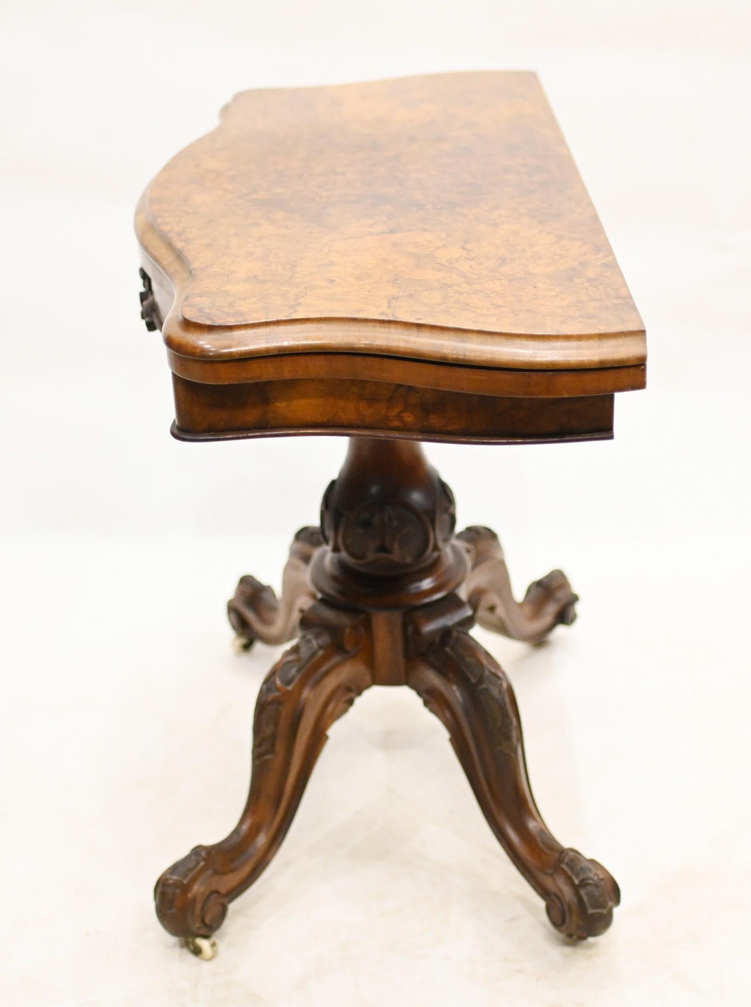 Quality Victorian card table in burr walnut
We date this piece to circa 1880
Table opens out to reveal green beize lined playing surface for cards or board games
Table can also serve as a decorative hall table
Bought from a private residence in