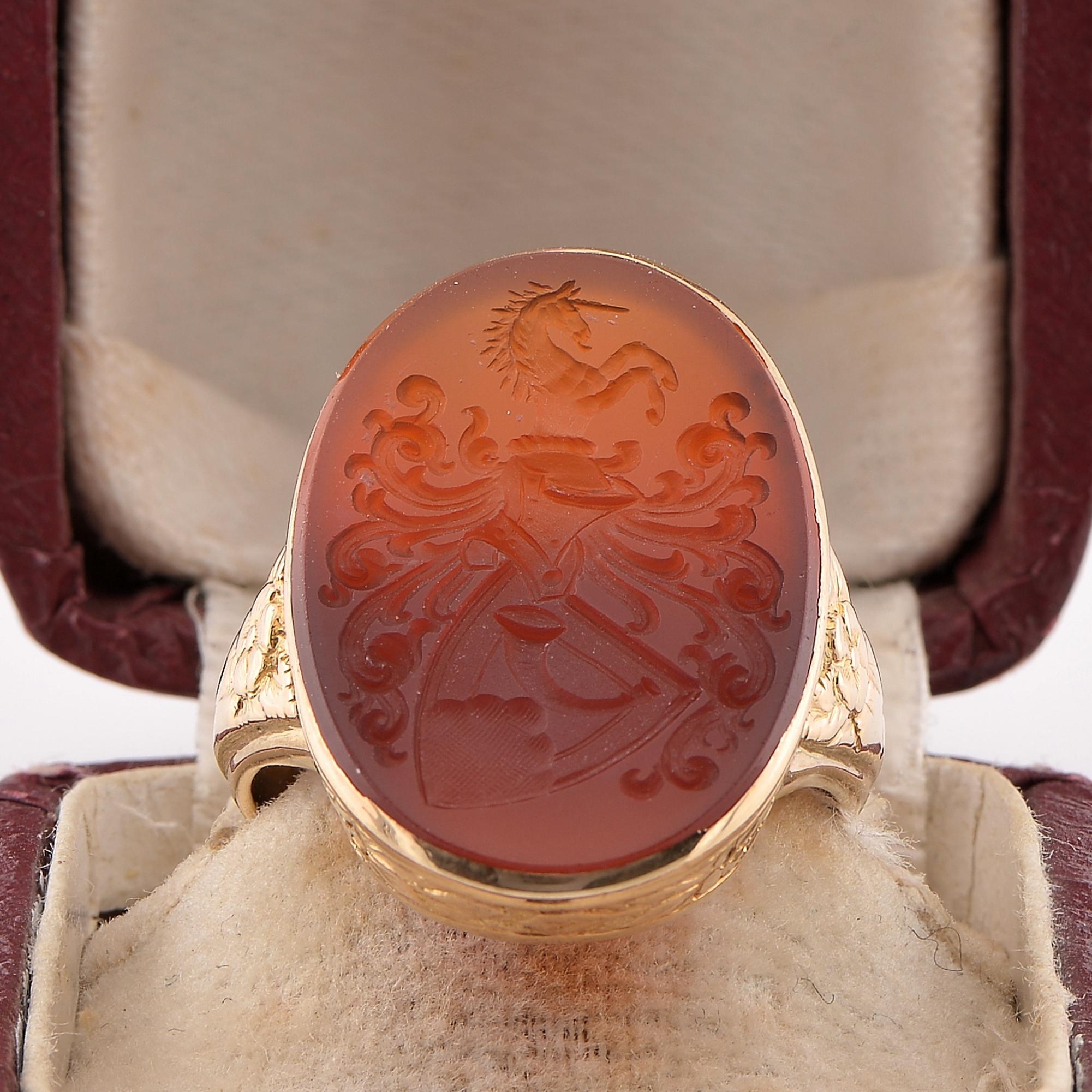 Victorian Signature Ring
A Stunning Victorian period armorial ring, skillful hand crafted of solid 14 Kt gold
Unique designed mount with flowers and leaf exalting the beauty of this ring
Intricate coat of arms skillfully engraved on Carnelian stone