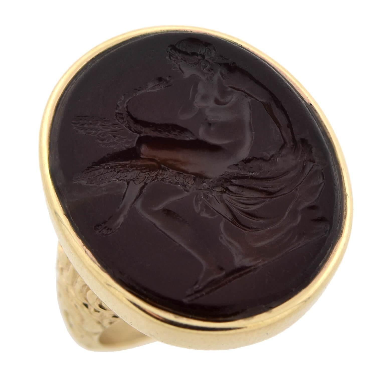 The opposite of a cameo, an intaglio is created by carving into the surface of a stone to produce an image in relief, with the purpose of pressing into sealing wax. A signet ring can be represented with an intaglio, or with a simple smooth seal. Its