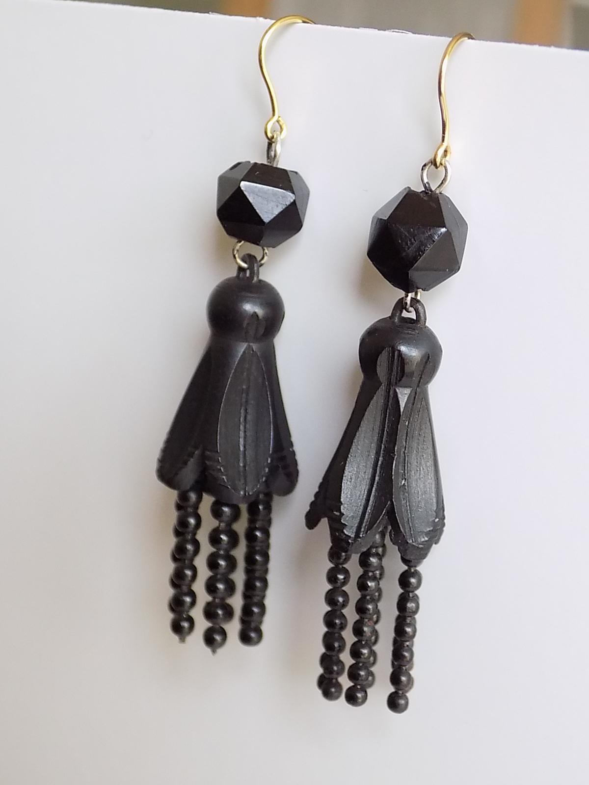 Outstanding Victorian c.1880 carved Bog Oak Fuchsia drop earrings for pierced ears. The earrings complete with a brand new 9 Carat Gold hook wires. English origin. 
Total drop including hooks 65mm
Width of the flower head 13mm.
Weight 8.6gr.
Hooks