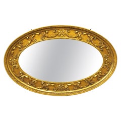 Victorian Carved Giltwood and Gesso Oval Mirror