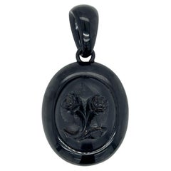 Victorian Carved Jet and Yellow Gold Pendant Locket