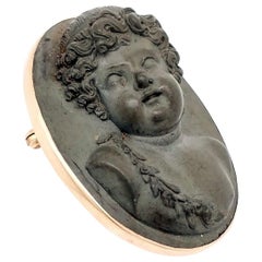 Victorian Carved Lava and 14 Karat Yellow Gold Cameo Attendant of Bacchus