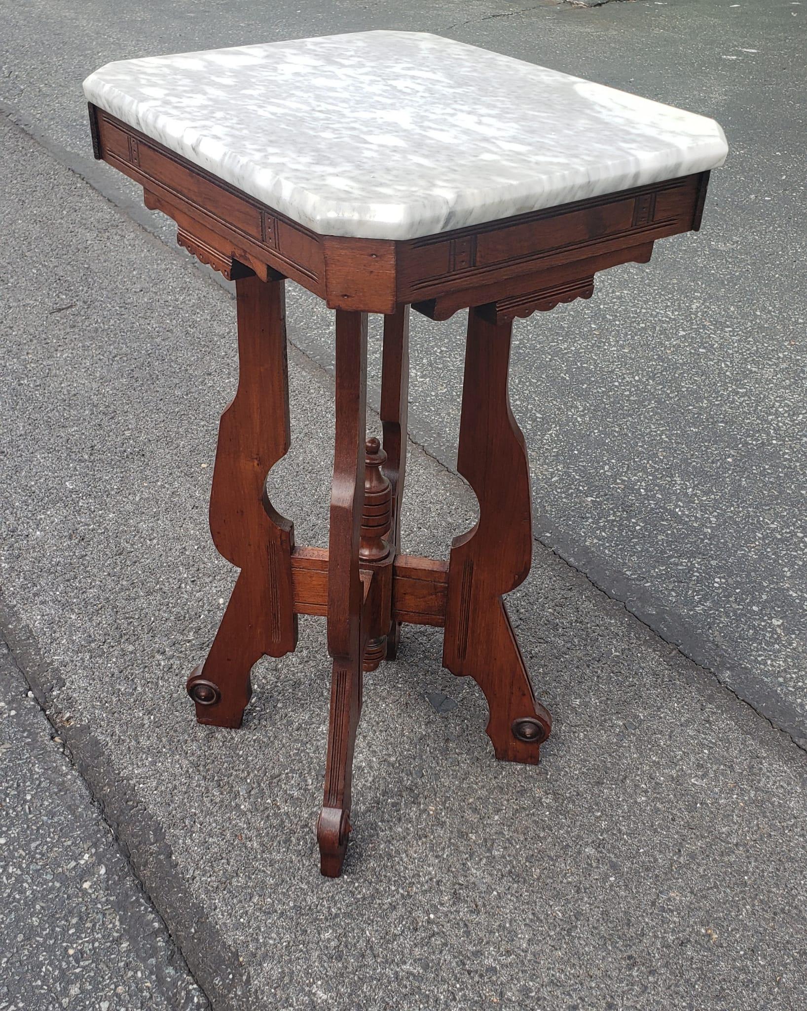Victorian refinished Carved Mahogany and Marble Top Candle Srand or Side Table in good antique condition. Measures 14
