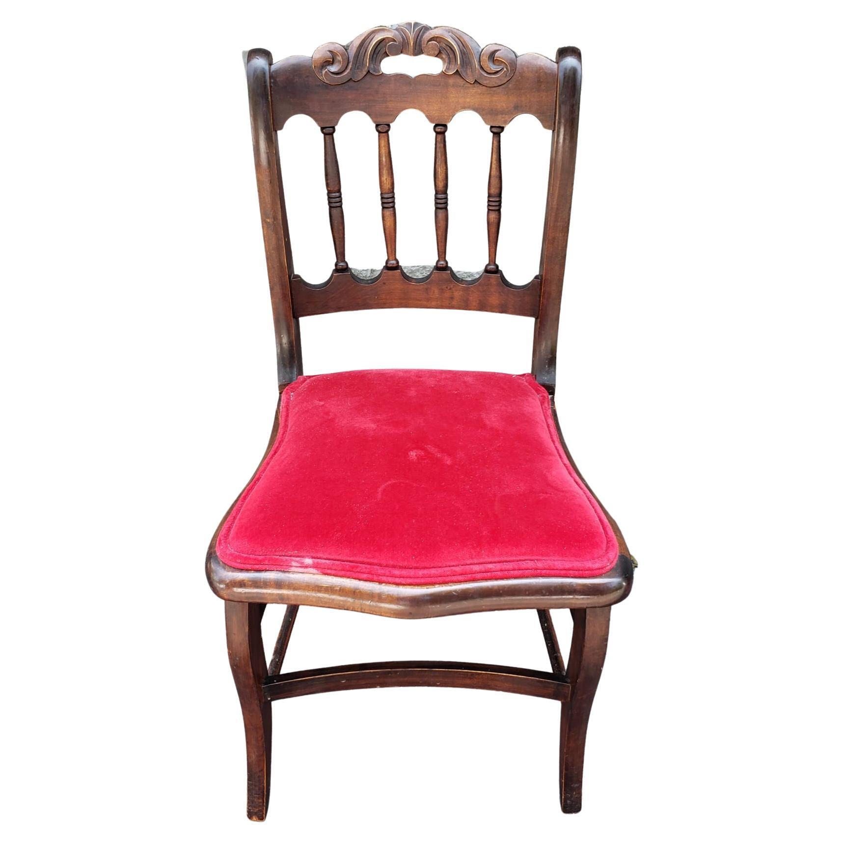 A late Victorian Carved Mahogany and Velvet Upholstered Seat Side Chair in very good antique and sturdy condition. Velvet upholstery in good condition. Measures 17