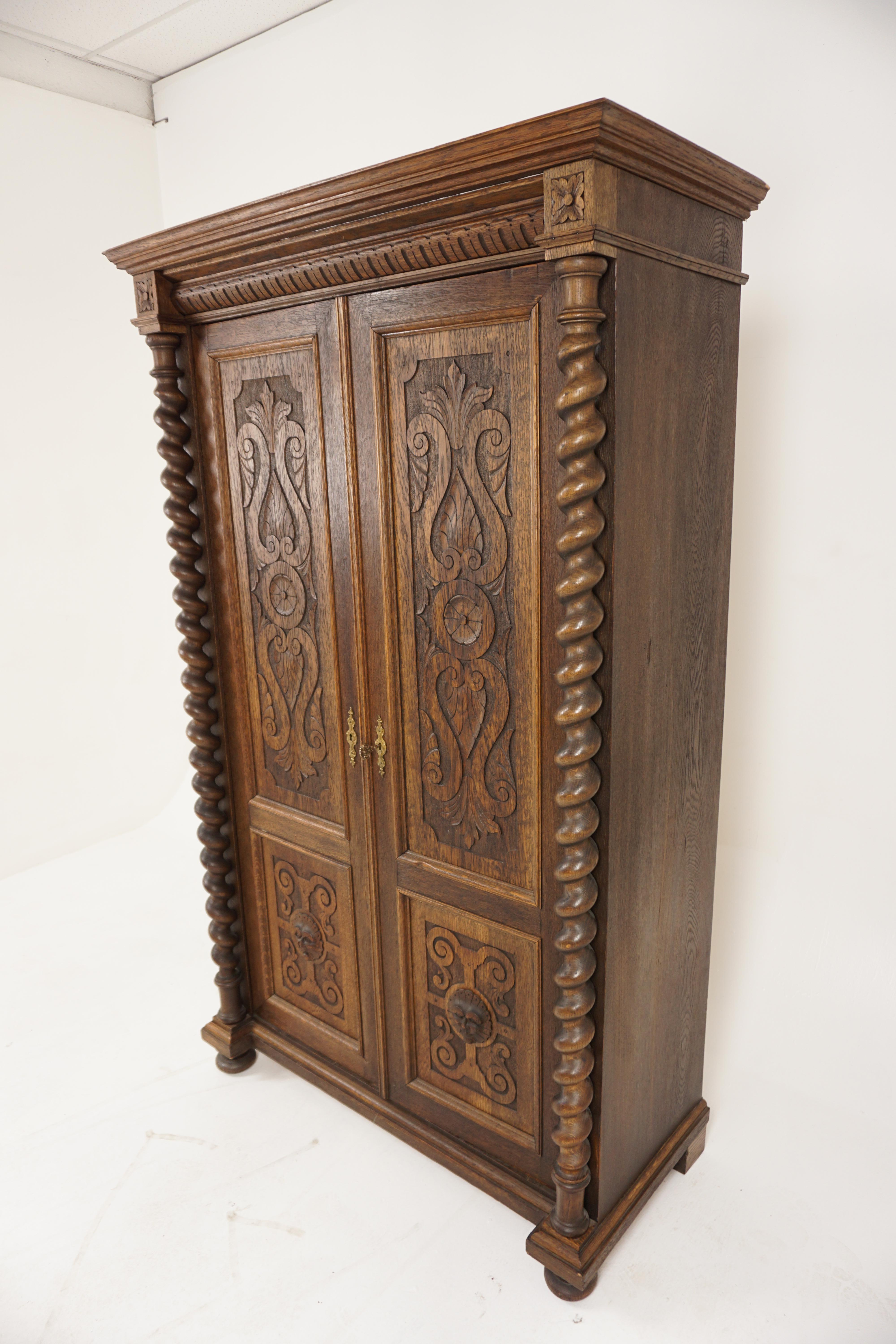 Victorian Carved Oak Hall Robe Barley Twist Closet, Bookcase, Scotland 1880, H1173

Scotland 1880
Solid Oak
Original Finish
With projecting moulded cornice on top
Carved frieze underneath
With tow carved panelled doors with scrolling foliage
Barley
